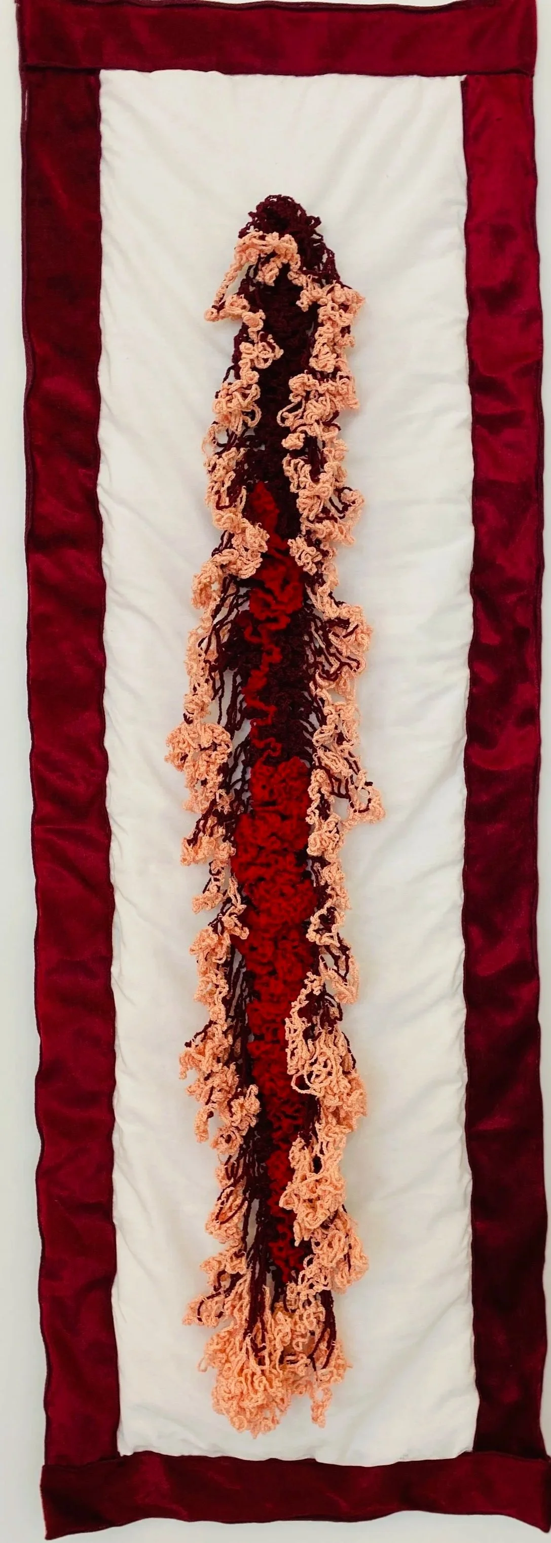 A Period Piece, 2022 Repurposed Materials: white cotton bed sheet, crochet threads and velvet holiday ribbons. 119 cm x 40 cm