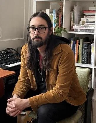 Joel Nelson (he/they)