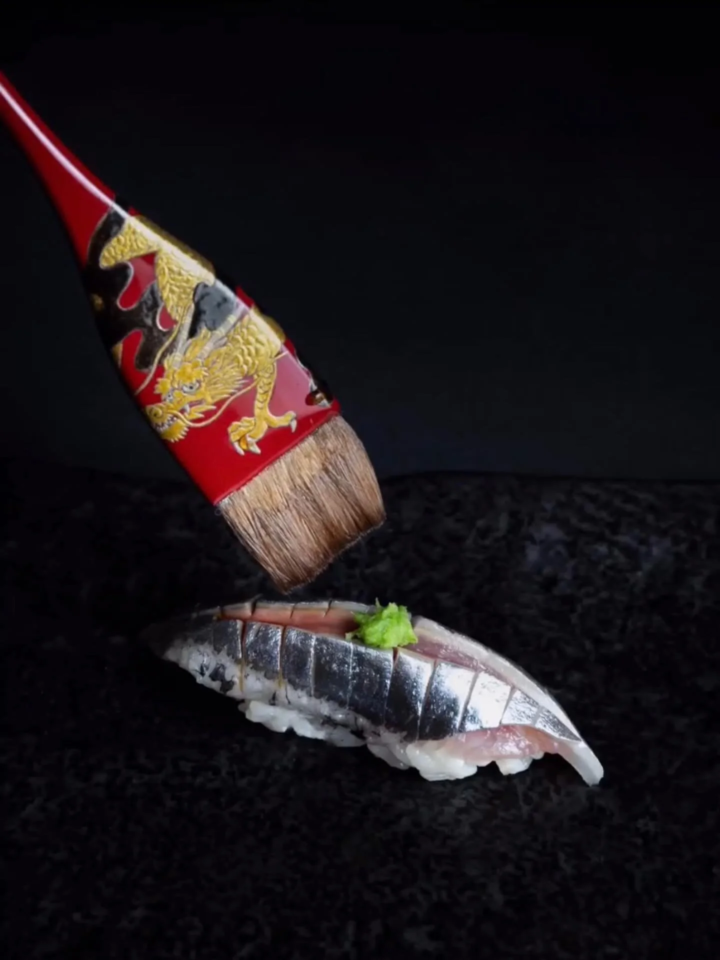 Nikiri is the brush stroke.

A reduction of soy, sake, mirin, and dashi, cooked down until it carries weight without heaviness. At Tetsu it is made in-house, in small batches, and adjusted across the seasons.

The brush is drawn across the fish. The 