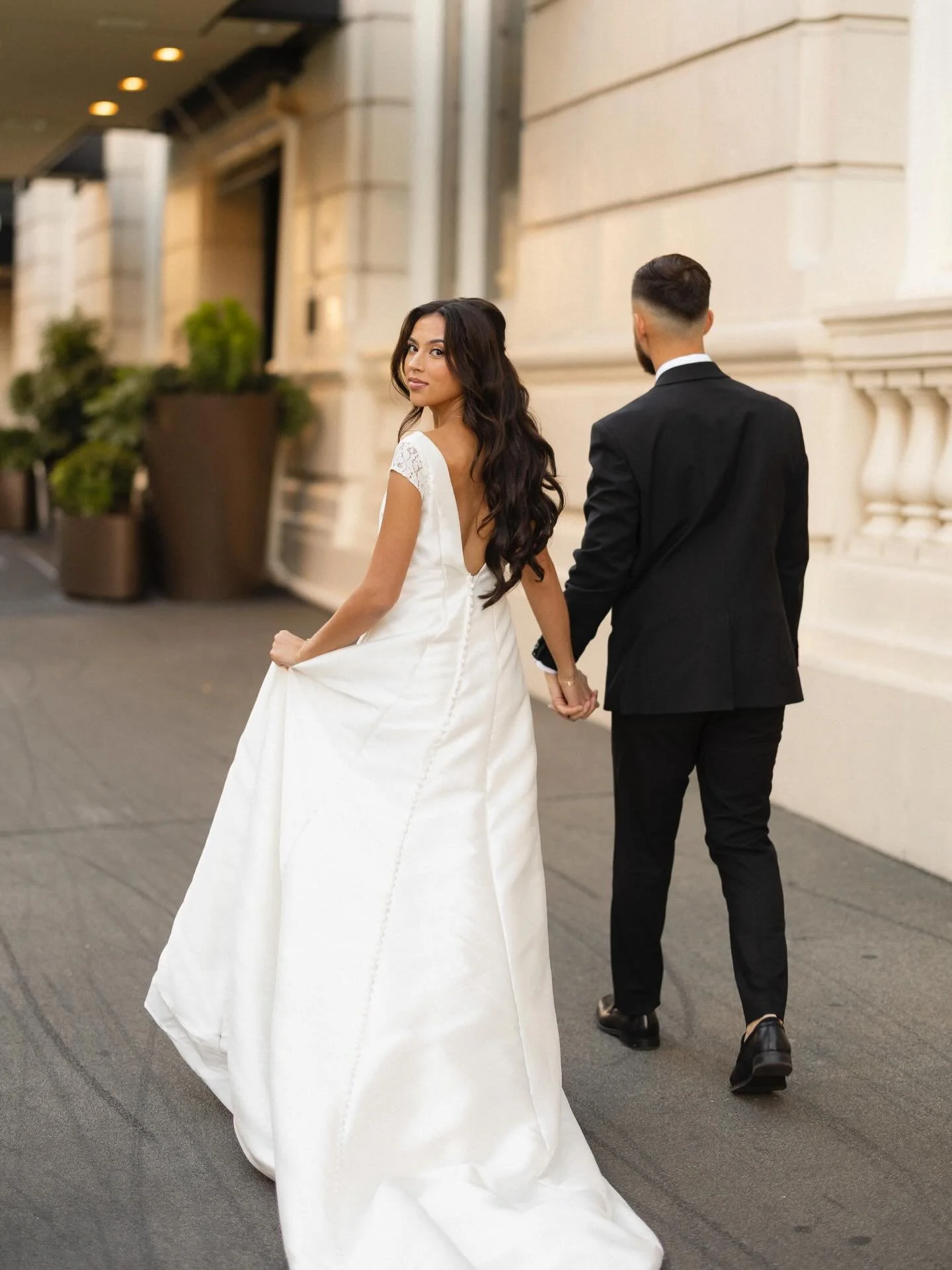 Some of the best portraits happen in between the moments&mdash;laughing, running, and being in the city together on David &amp; Cheridan&rsquo;s beautiful wedding day! 🤍 
.
.
.
#weddingphotographer #weddingportraits #weddinginspo #candidwedding #bri