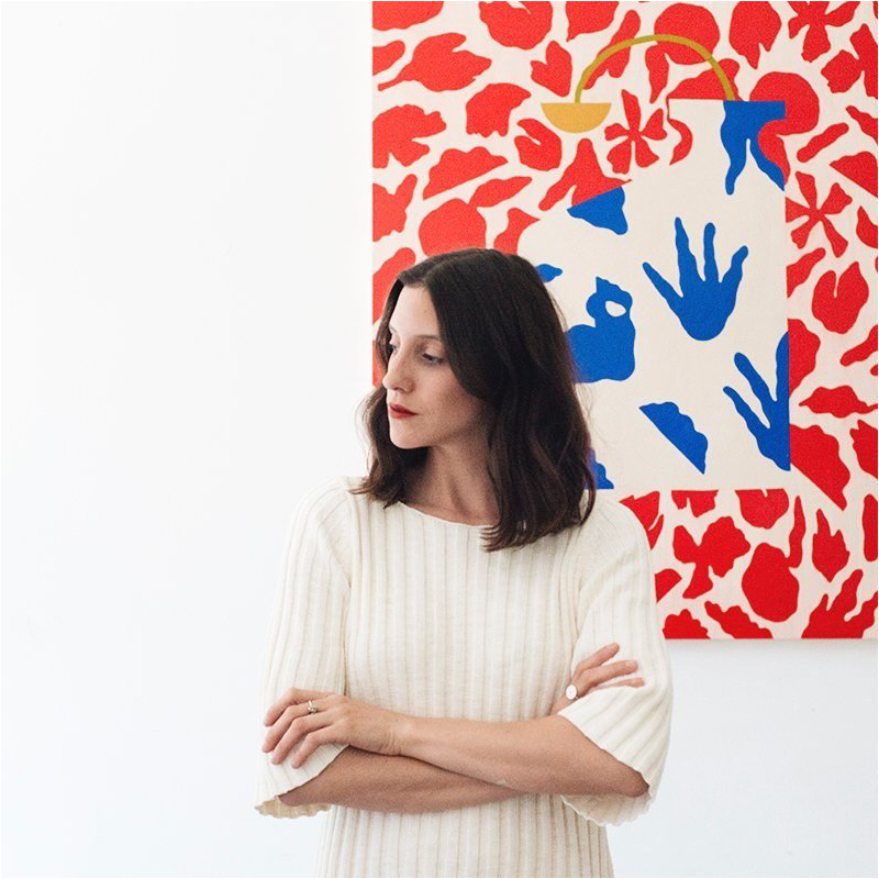 Shayla Bond of Bond Illustrations posing in white blouse