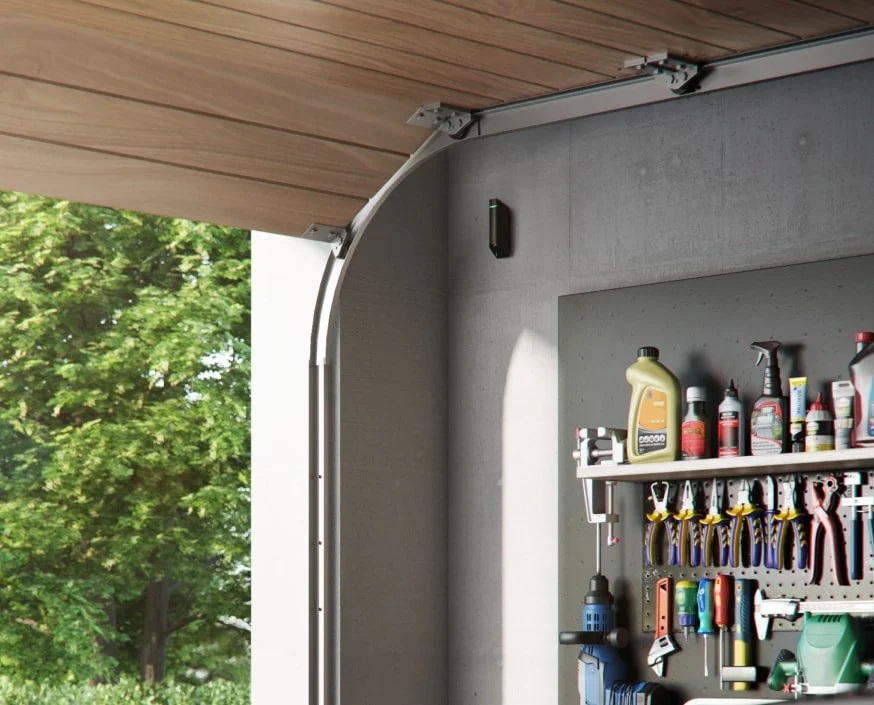 Wall-mounted motion sensor in a garage, part of a smart home security system by SA Smart Homes in South Africa,