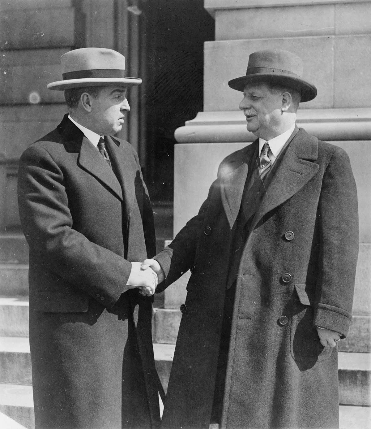 old fashioned gentleman shaking hands
