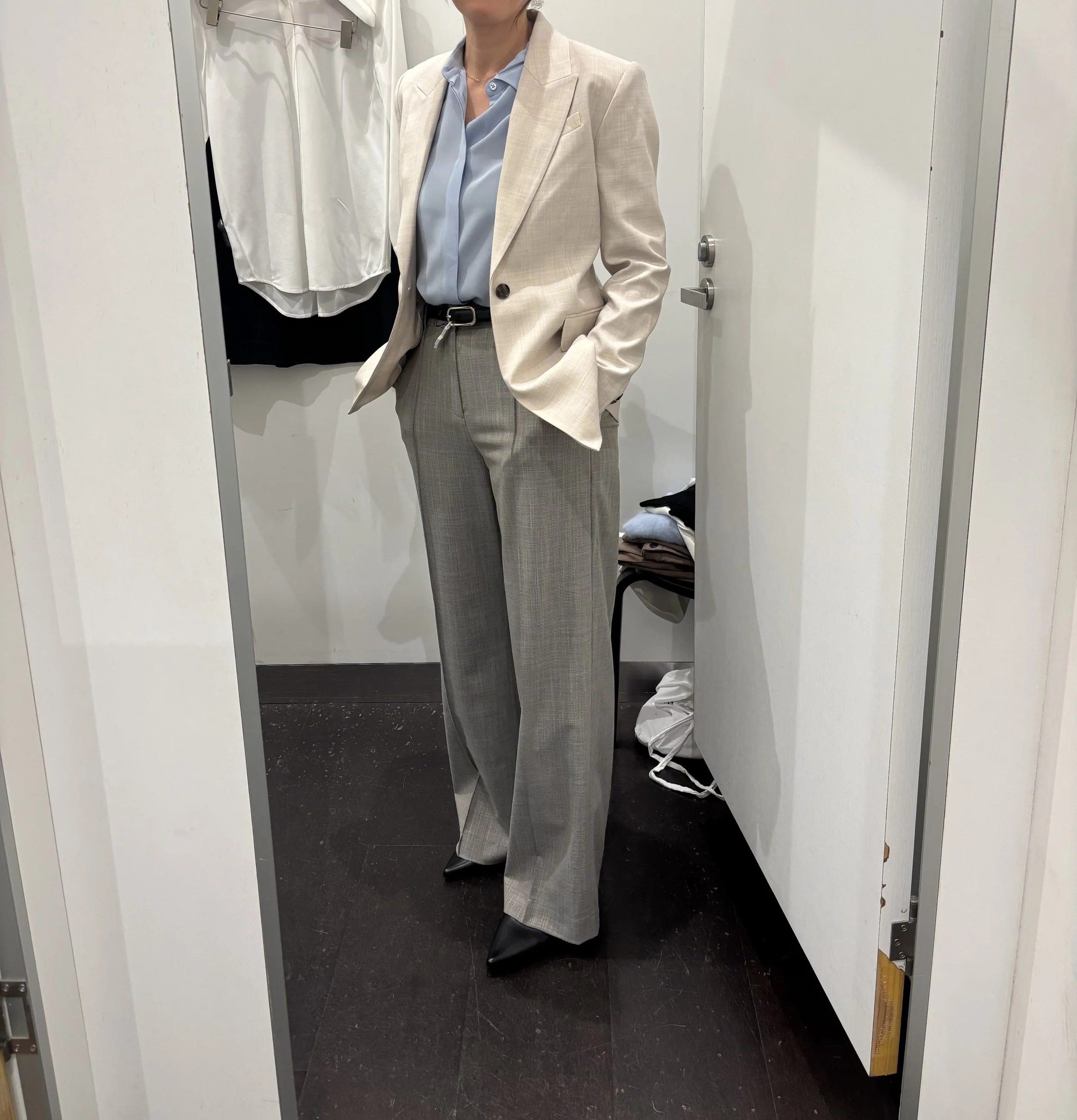 A woman wearing a suit for work.