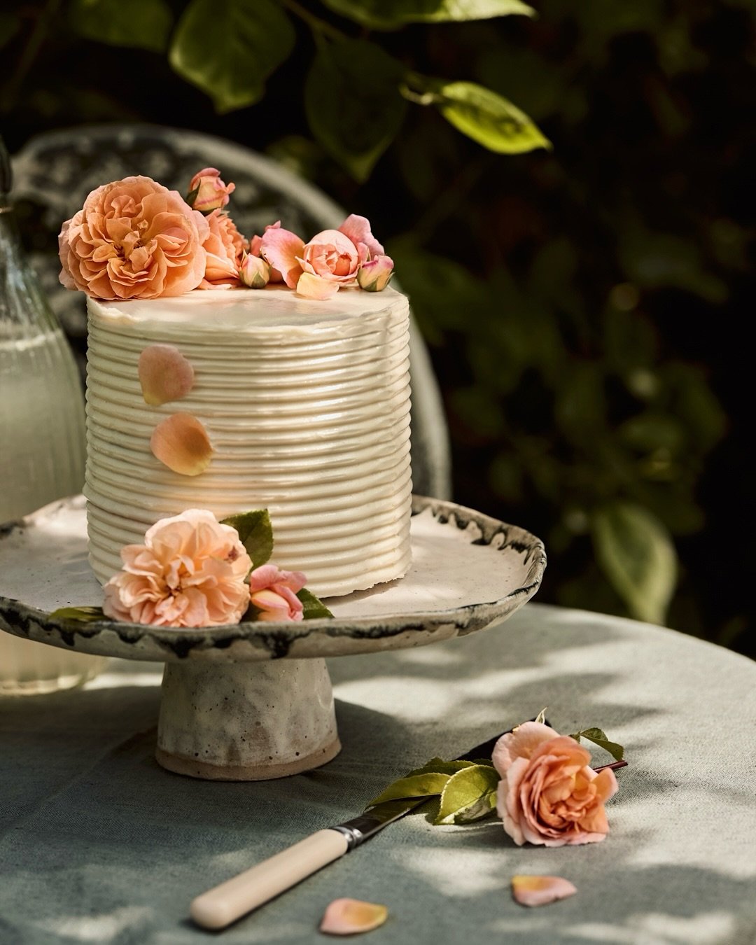 Sticky Ginger Layer Cake with Caramel Apple Butter

Set beneath trailing roses and clinking glasses, each slice tells a story: spice and sweetness tangled in soft, sun-dappled layers, made to be shared under the spell of an English sky.
Created with 