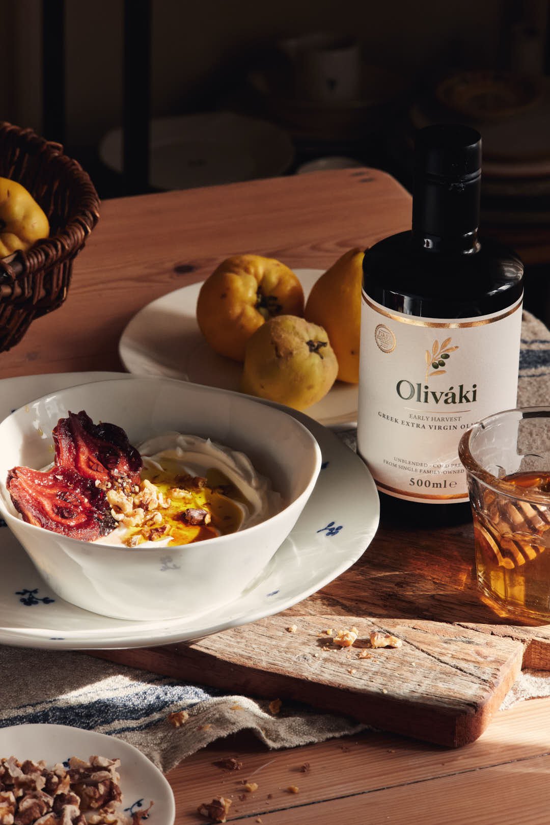 angled  image sticky quince yogurt bowl with olive oil bottle