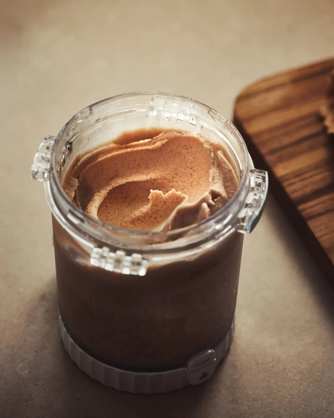 ninja creami vessel with swirled cinnamon ice cream, macro image