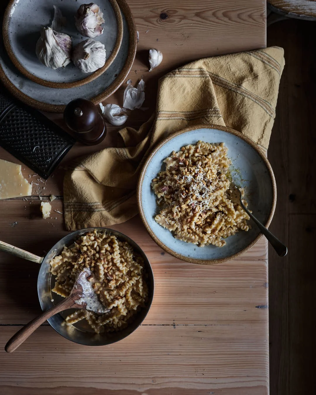 flatlay image of pasta in bowl on farmhouse table