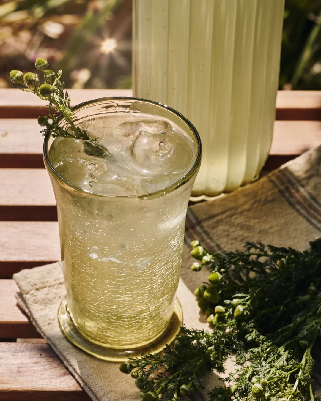 close up image of cordial in glass in hard sunlight