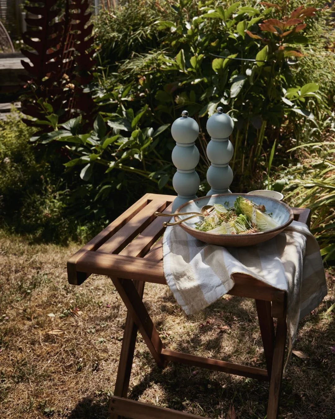 wedge lettuce salad with stunning textures and creamy dressing in summer garden scene