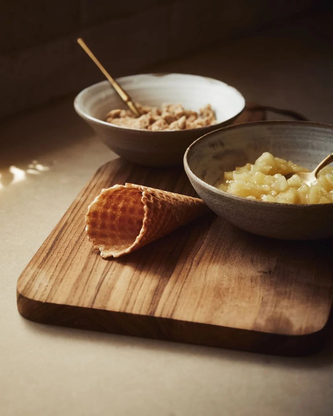 waffle cone ready to be filled on wooden board