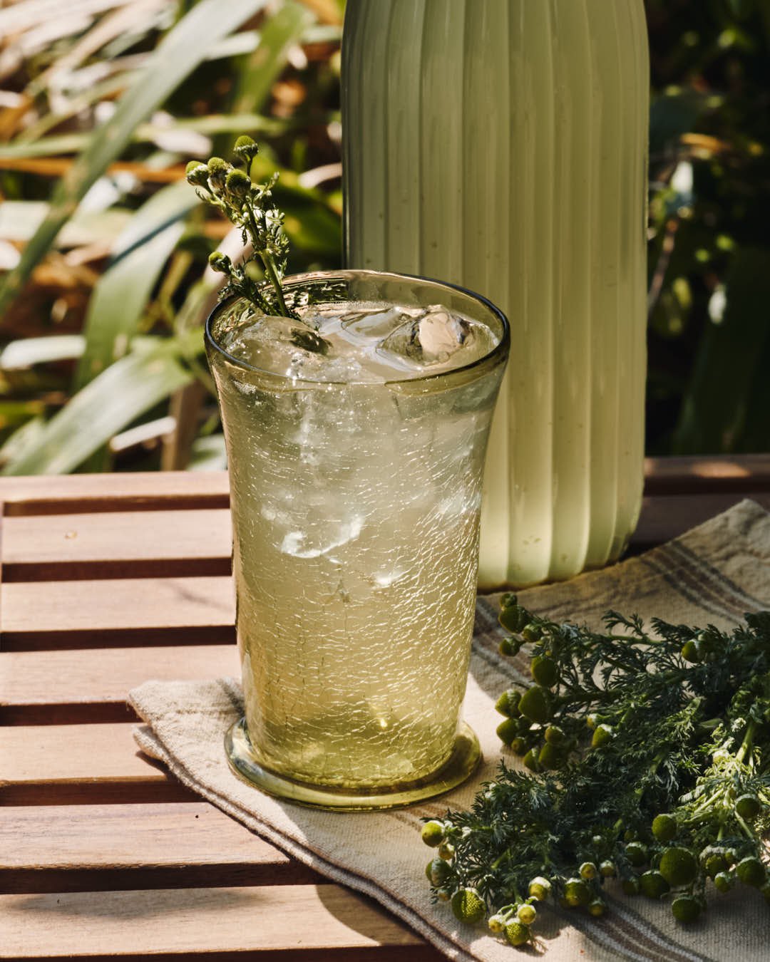 straight on image of cordial in glass in hard sunlight