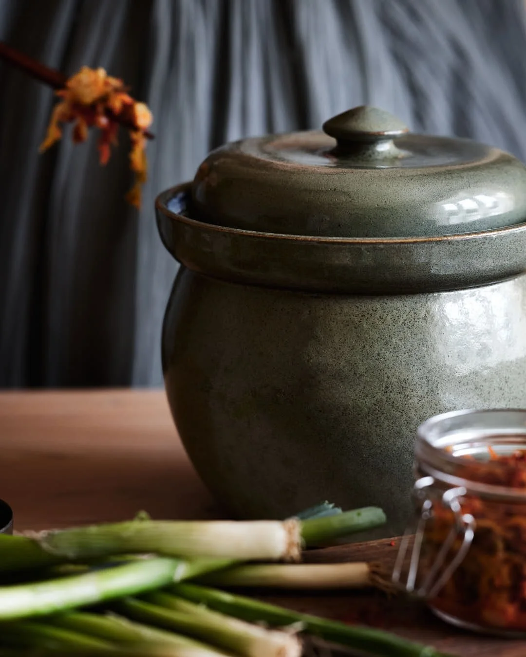 macroimage of fermentation crock in stunning moody lit scene