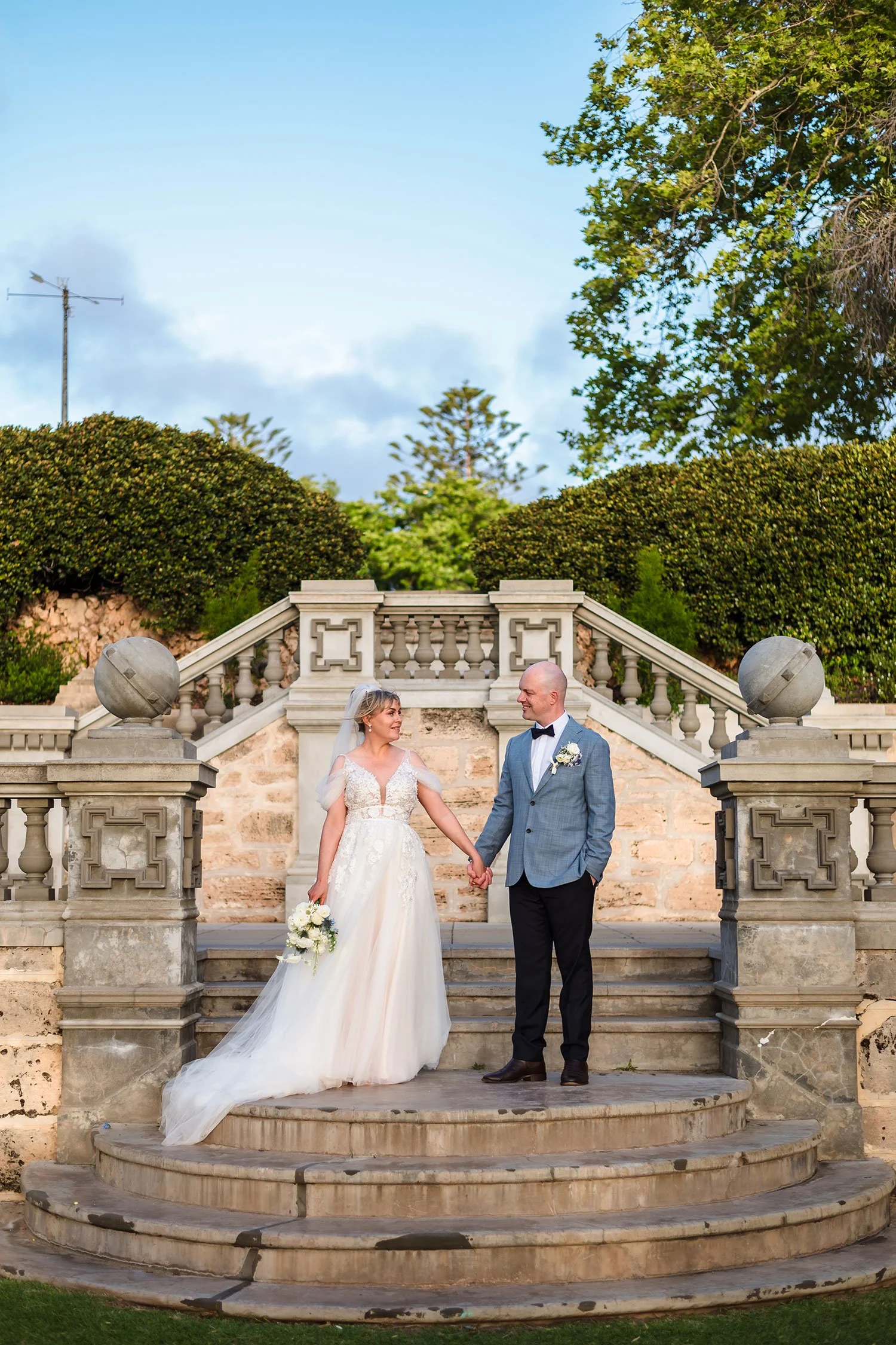 Wedding couple on the staircase at Cottesloe Civic Centre