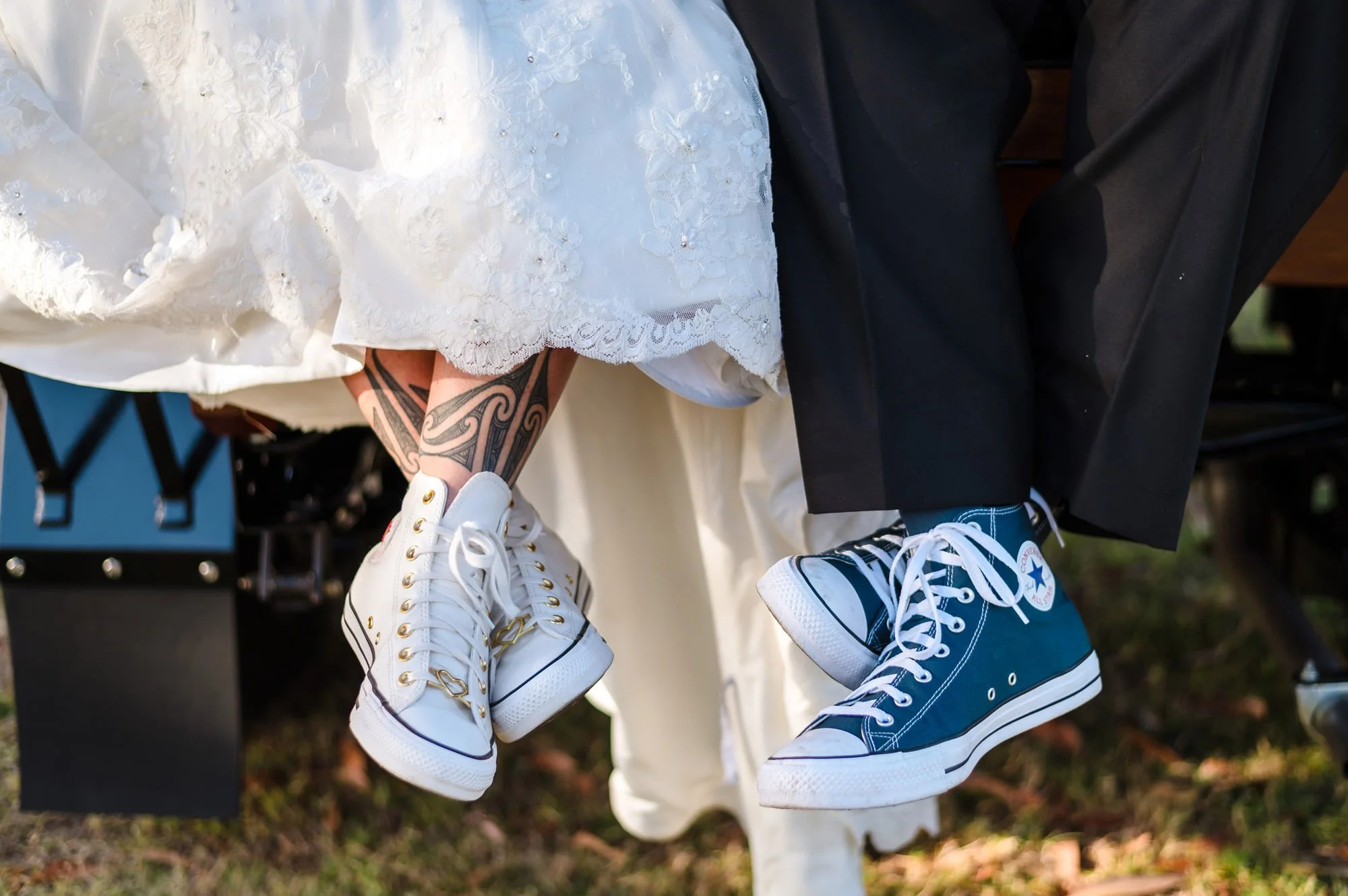 Relaxed fun wedding photo of a couple wearing sneakers at their Swan Valley wedding.