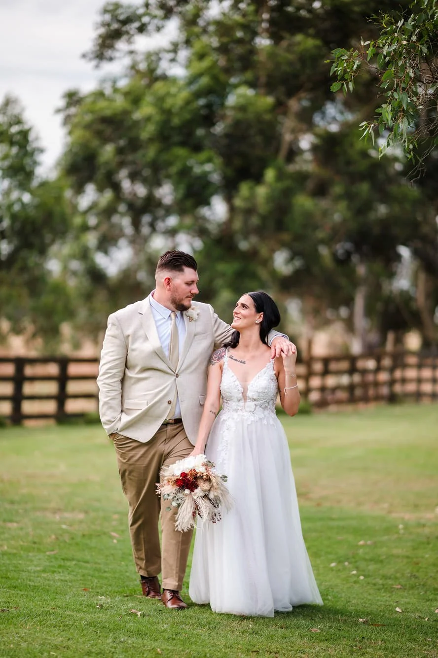 Relaxed candid moment of wedding couple at rustic Country Charm Weddings - Baldivis Farm Stay, Perth
