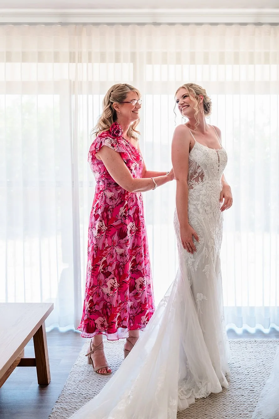 Bride with mum helping her get ready before her Perth wedding.
