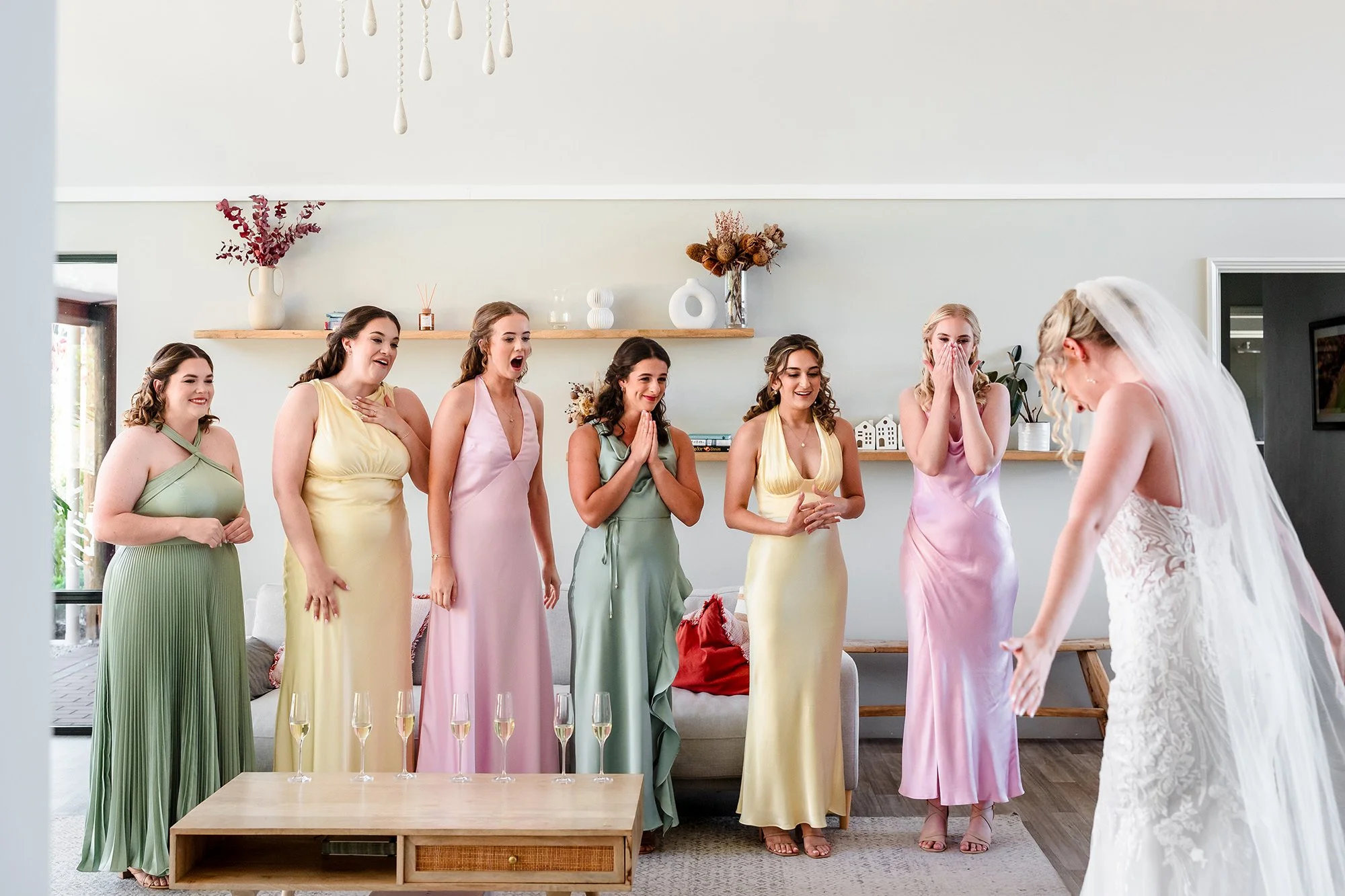 Bridesmaids emotional moment seeing the bride in her dress for the first time - Perth Wedding Photography.