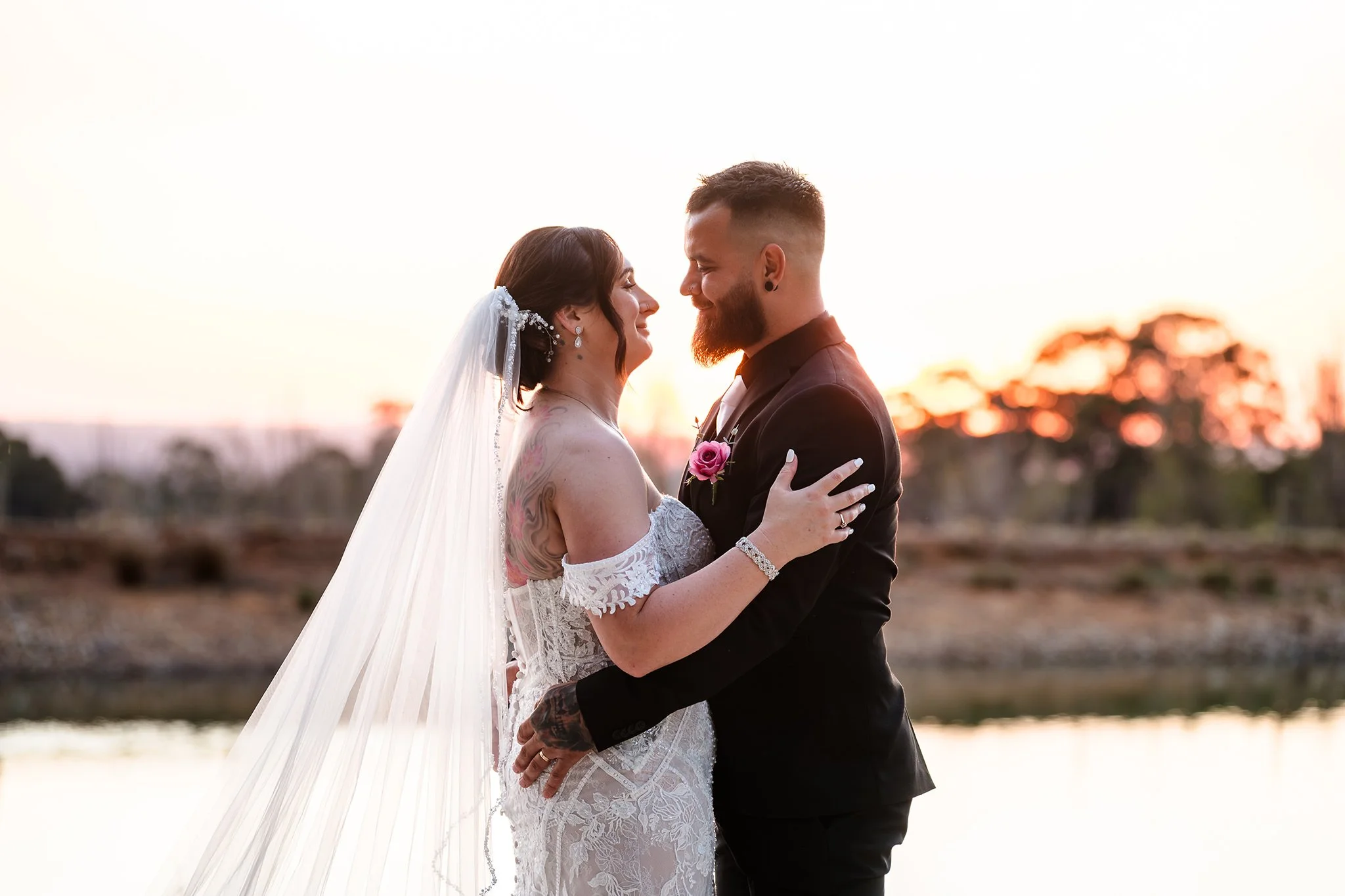 Wedding couple in golden hour light at their Quarry Farm Wedding, Perth.
