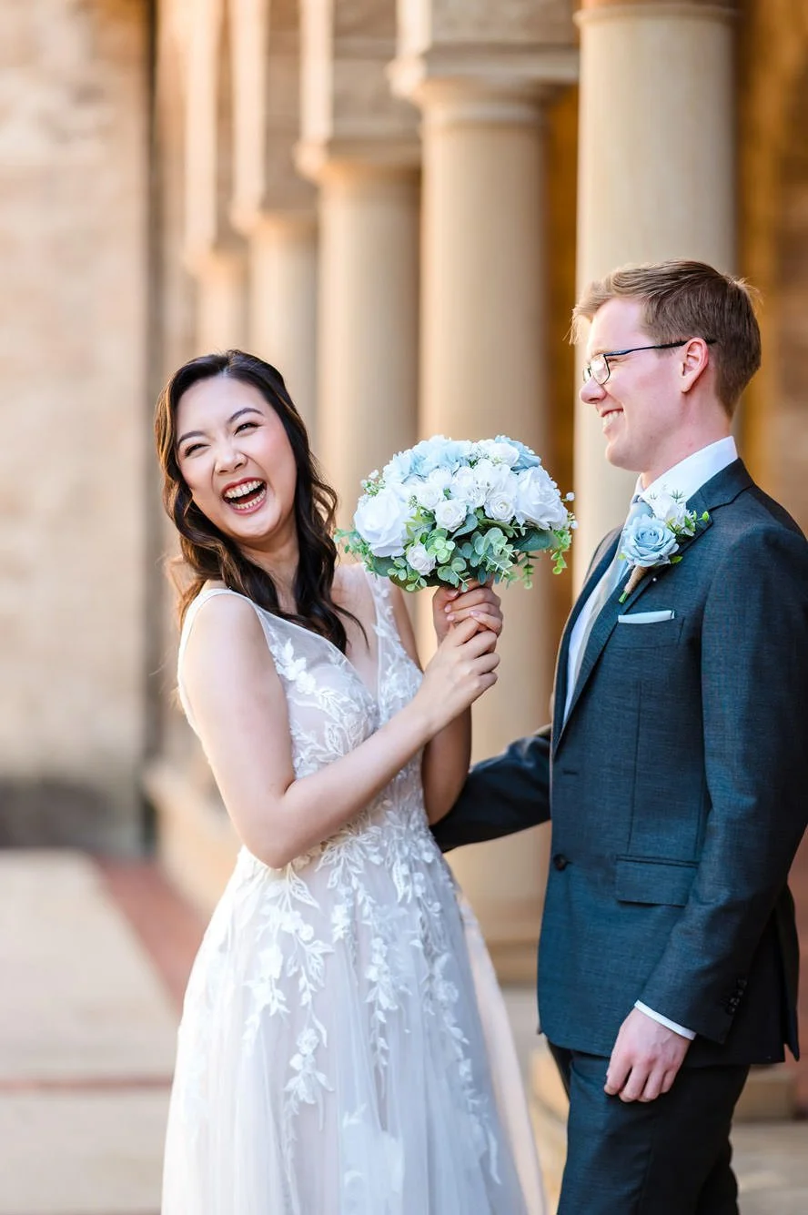 Fun candid moment with of a wedding couple at UWA in Perth