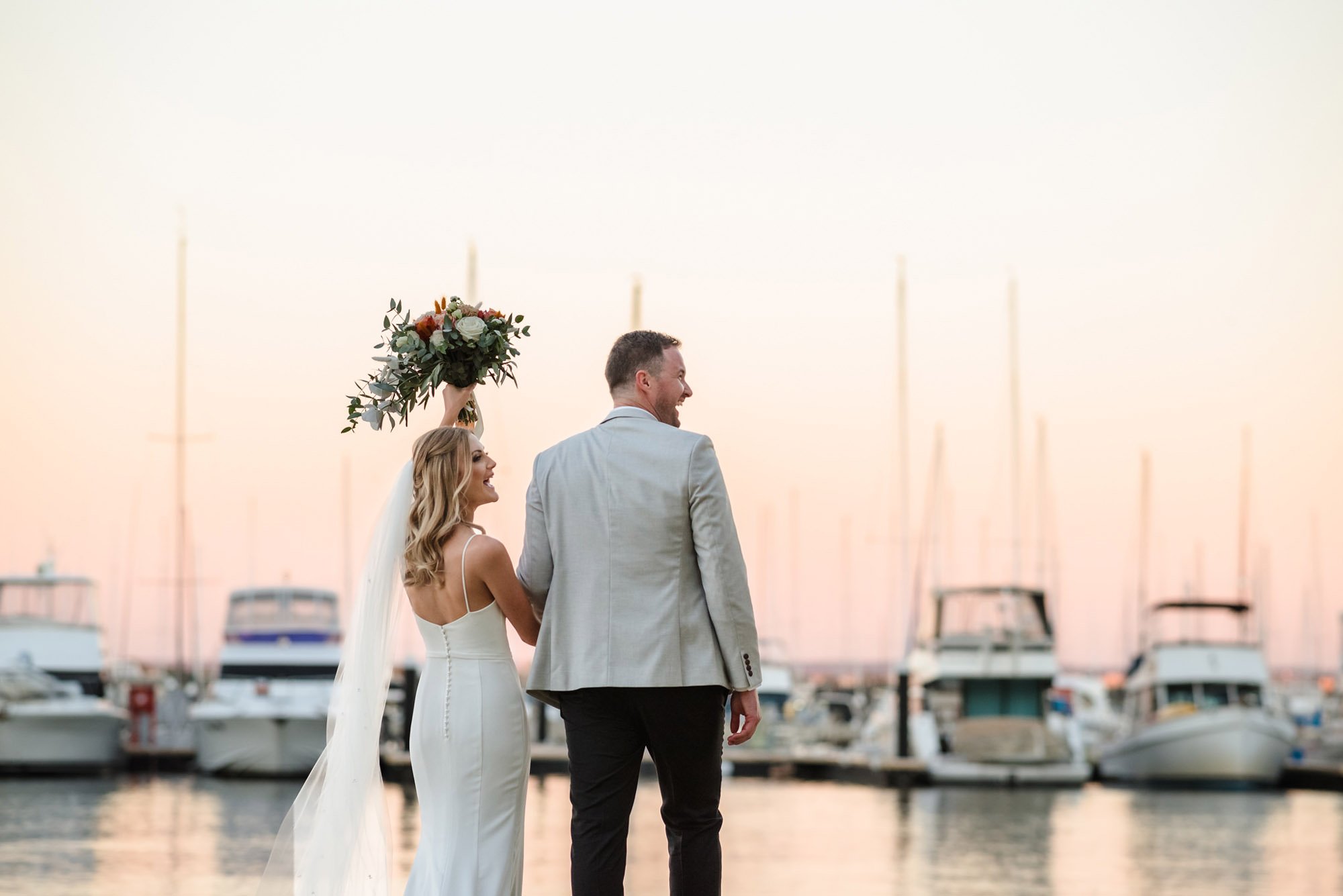 Matilda Bay wedding couple with the Swan River as a backdrop at dusk