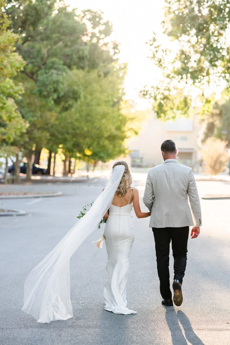 Candid wedding portrait at Matilda Bay, captured with dreamy dusk light and true colour wedding photography in Perth.