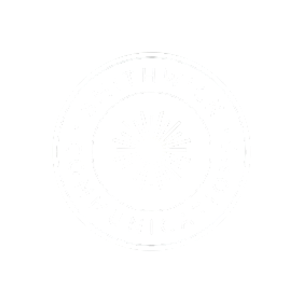 A close-up of a round, white 3D deposit slip with printed instructions and a vortex design at the center, against a black background.