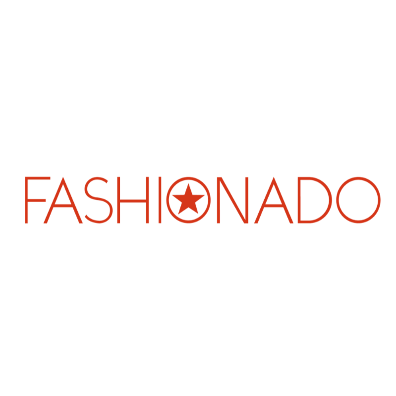Graphic design with the phrase "The World of Fashion" in black and red text, featuring a star inside a circle in place of the letter "O" in "Fashion".