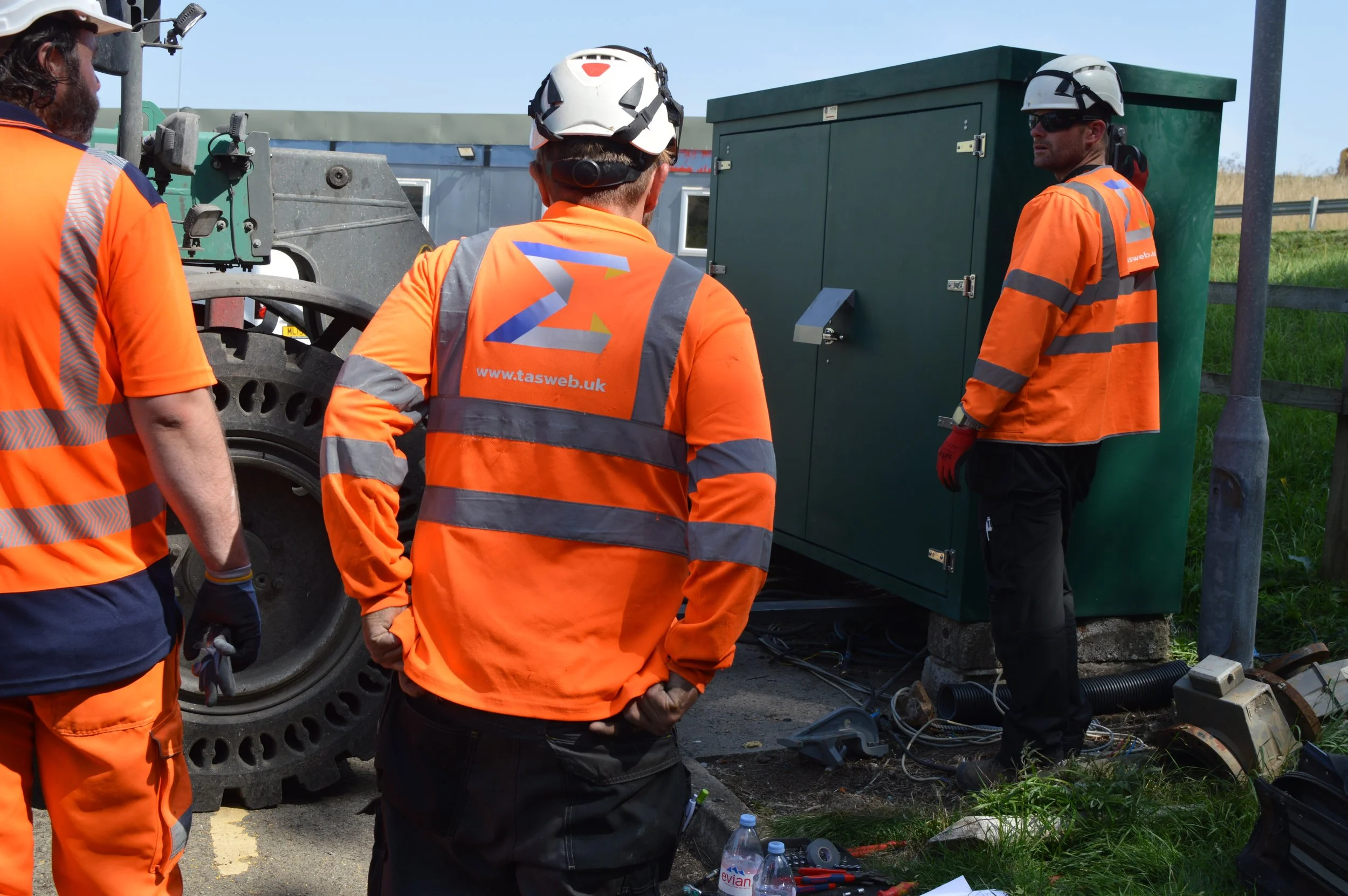 image showing Total Automated Solutions team with customer, new panel just been placed before team needs to get in and reinstall.