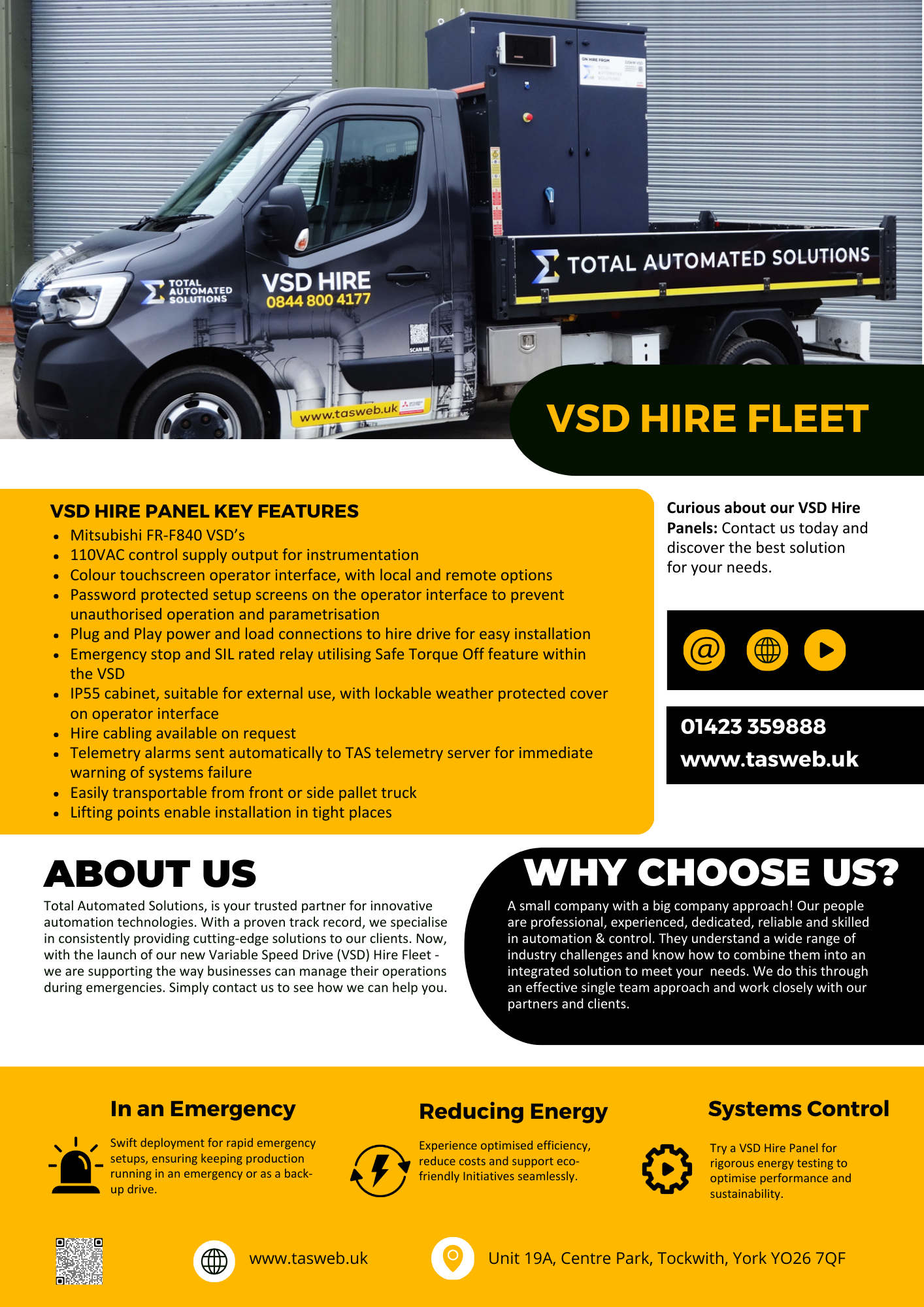 A dark gray utility truck with 'VSD Hire' branding and contact details parked in front of a metal building. The truck is equipped with a large blue control cabinet on its flatbed.