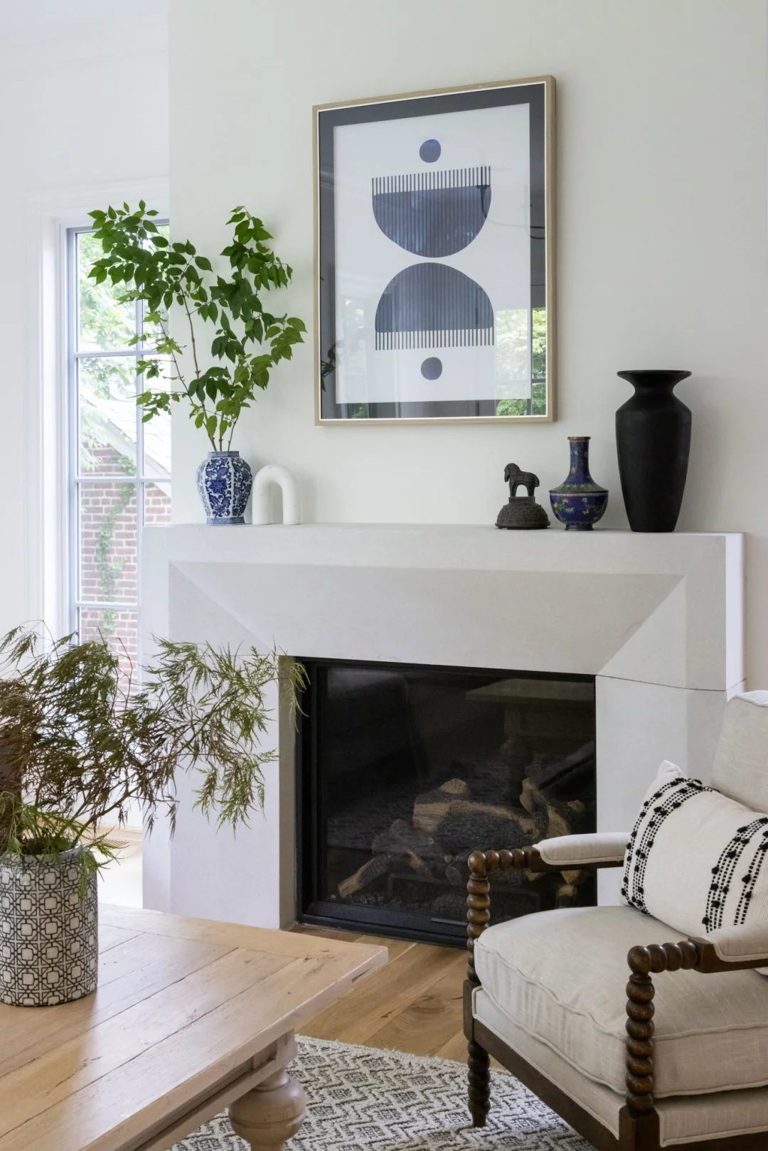 Details we love.

Fireplaces, natural light, and layered textures play a quiet but important role in how a home feels.  And don't underestimate the power of live plants, flowers or branches from your local grocery store or your own backyard!

Photos 