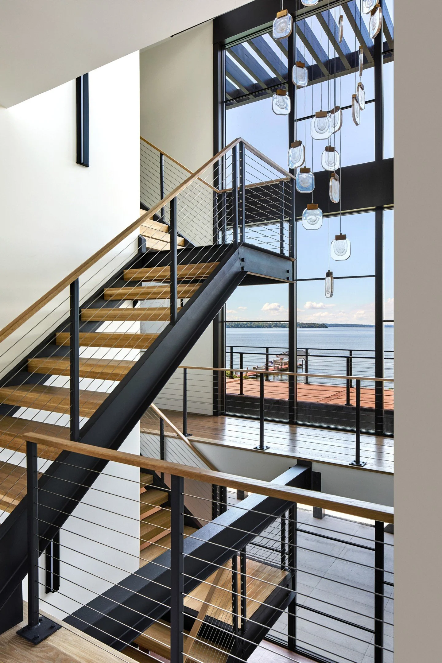 A staircase should do more than connect spaces&hellip; it should make a statement! 

From the clean architectural lines to the warmth of the wood details, every angle of this home was designed to feel intentional, elevated, and inviting. 🤍

Built wi