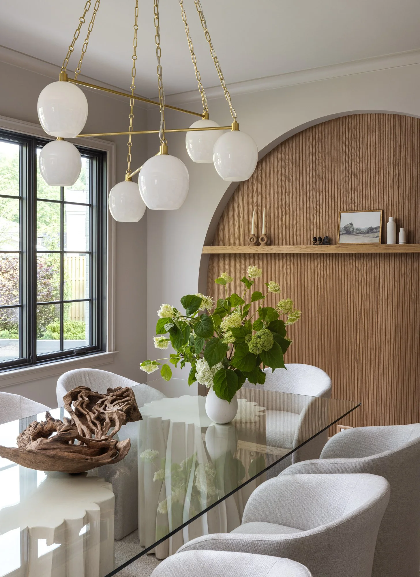 Tailored traditional dining space with elegant finishes by Wellhouse & Co.