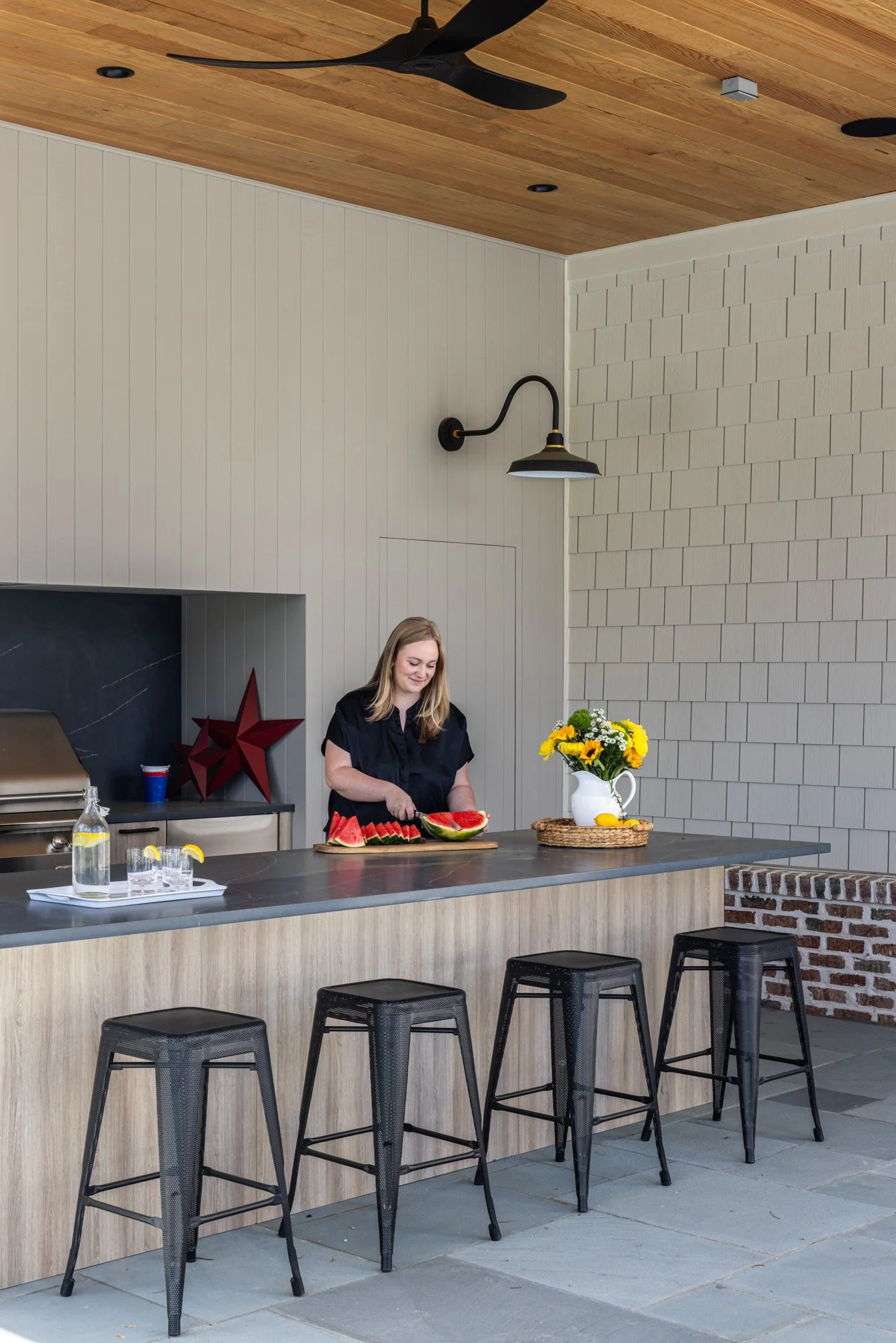 Outdoor prep area and entertaining space by Wellhouse & Co.