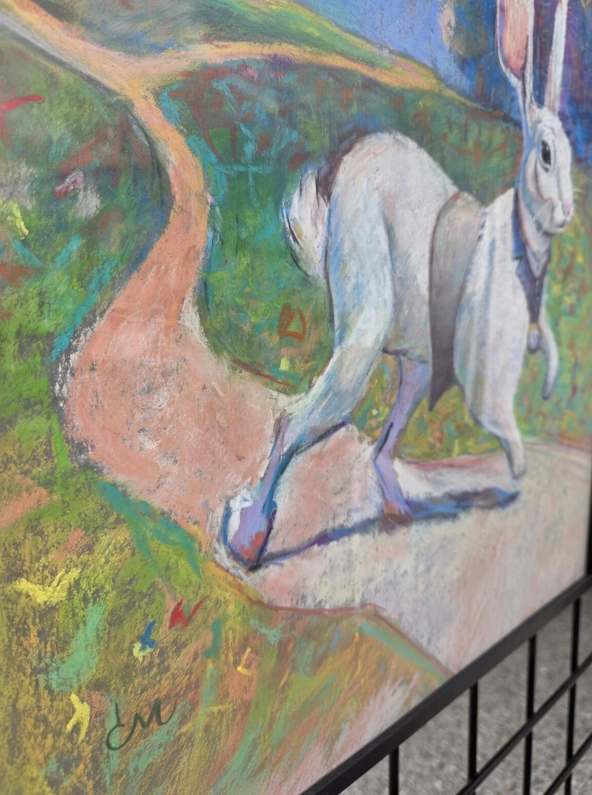 Close-up of the rabbit's feet and signature, soft pastel by Chad McLaren