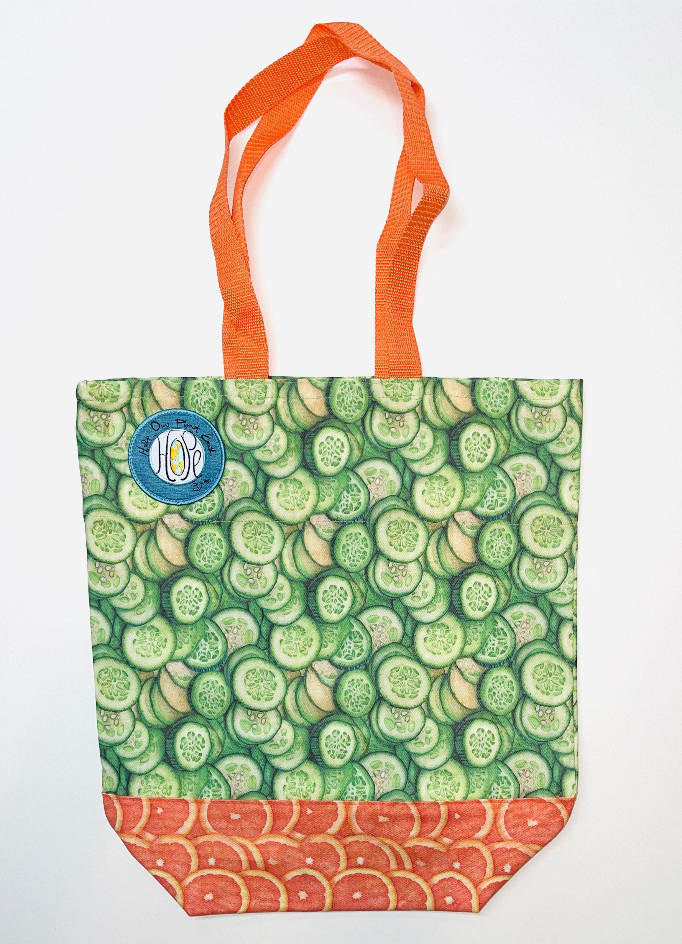 Cucumbers on Oranges Produce Bag