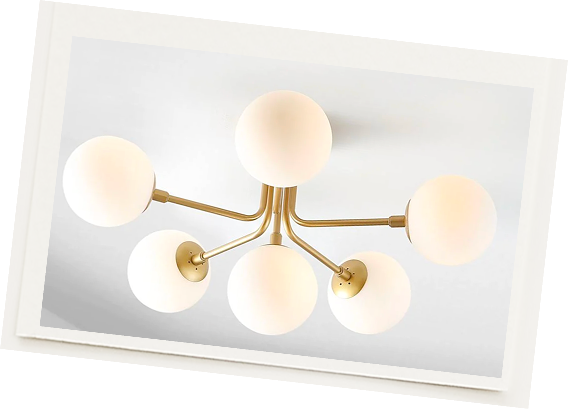 Modern brass five-light ceiling chandelier with round frosted glass globes