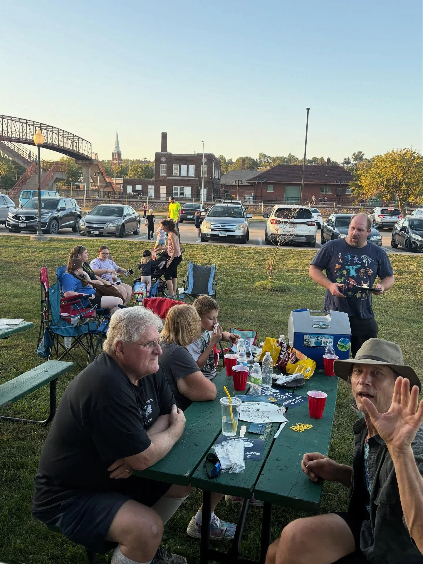 Families spending time along the riverfront during River &amp; Rail Weekend!