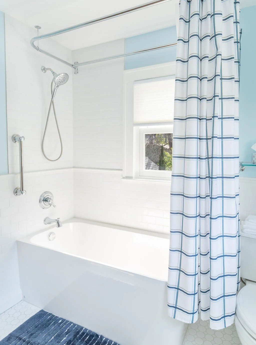 What started as a leaking toilet became a full second-floor bathroom remodel in this historic Ann Arbor home. After extensive subfloor damage, we worked with the homeowners to create a space that honors the home's original character while adding mode