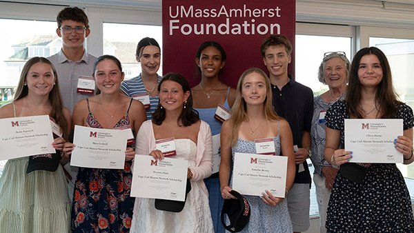 The 2026-27 Cape Cod Alumni Network Scholarship recipients gather for a photo with Scholarship Committee Chair Sheryl Lajoie '69.
