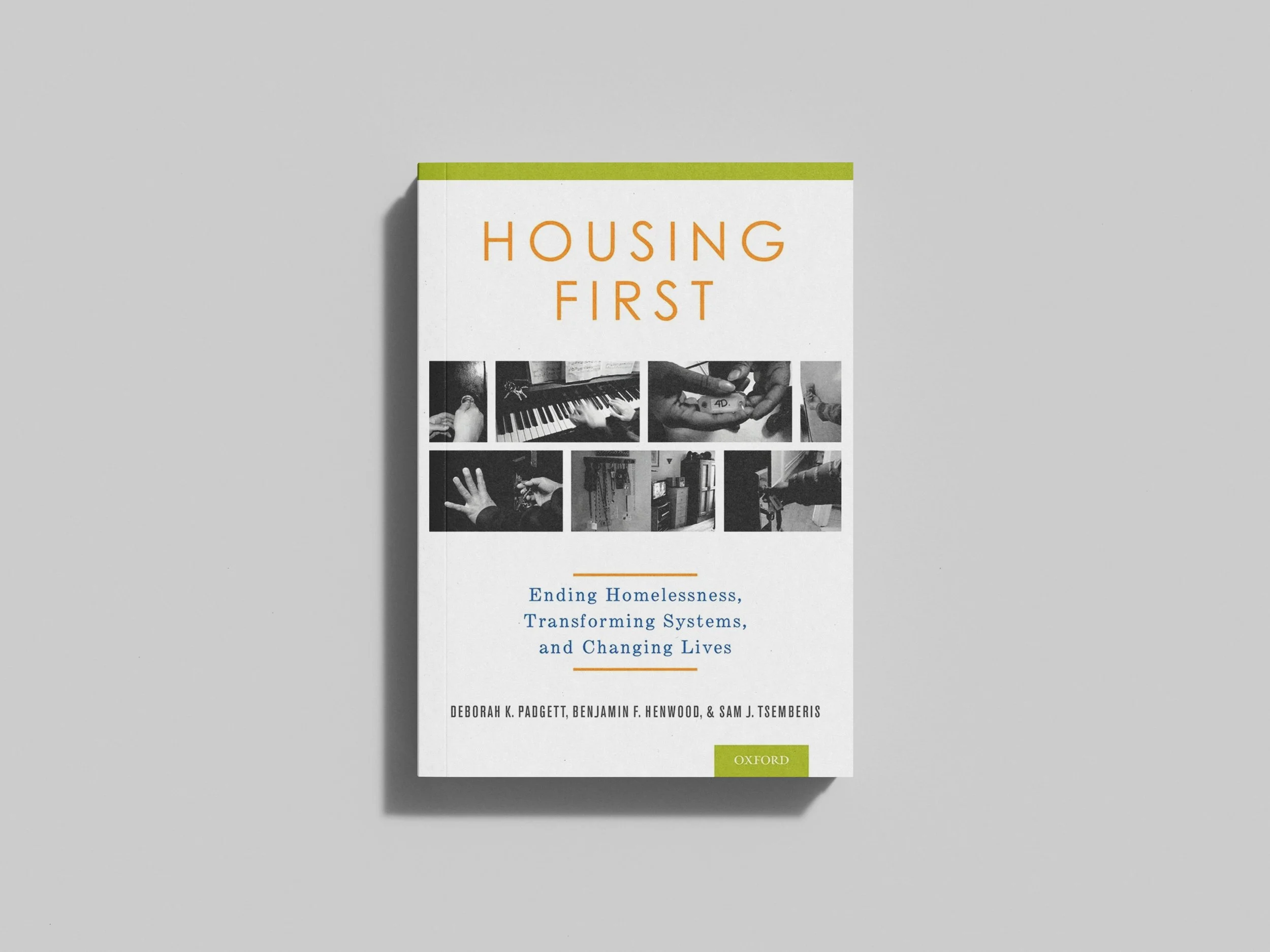 Book titled 'Housing First' with the subtitle 'Ending Homelessness, Transforming Systems, and Changing Lives' authored by Deborah K. Padgett, Benjamin F. Henwood, and Sam J. Tsemberis, published by Oxford, with a white cover featuring black and white images.
