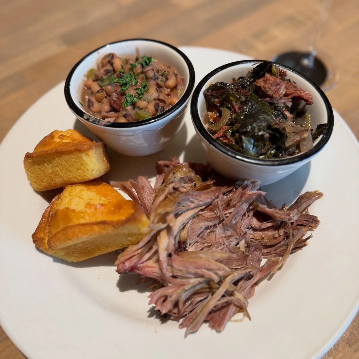 🍀 Good luck tastes like this 🍀

Black-eyed peas for prosperity.
Greens for wealth.
Pulled pork because&hellip; balance.

A New Year&rsquo;s tradition worth keeping.
Our Lucky Meal is back today only.
✨ $22

 
⏰ NEW YEAR&rsquo;S DAY HOURS: 11:30am -