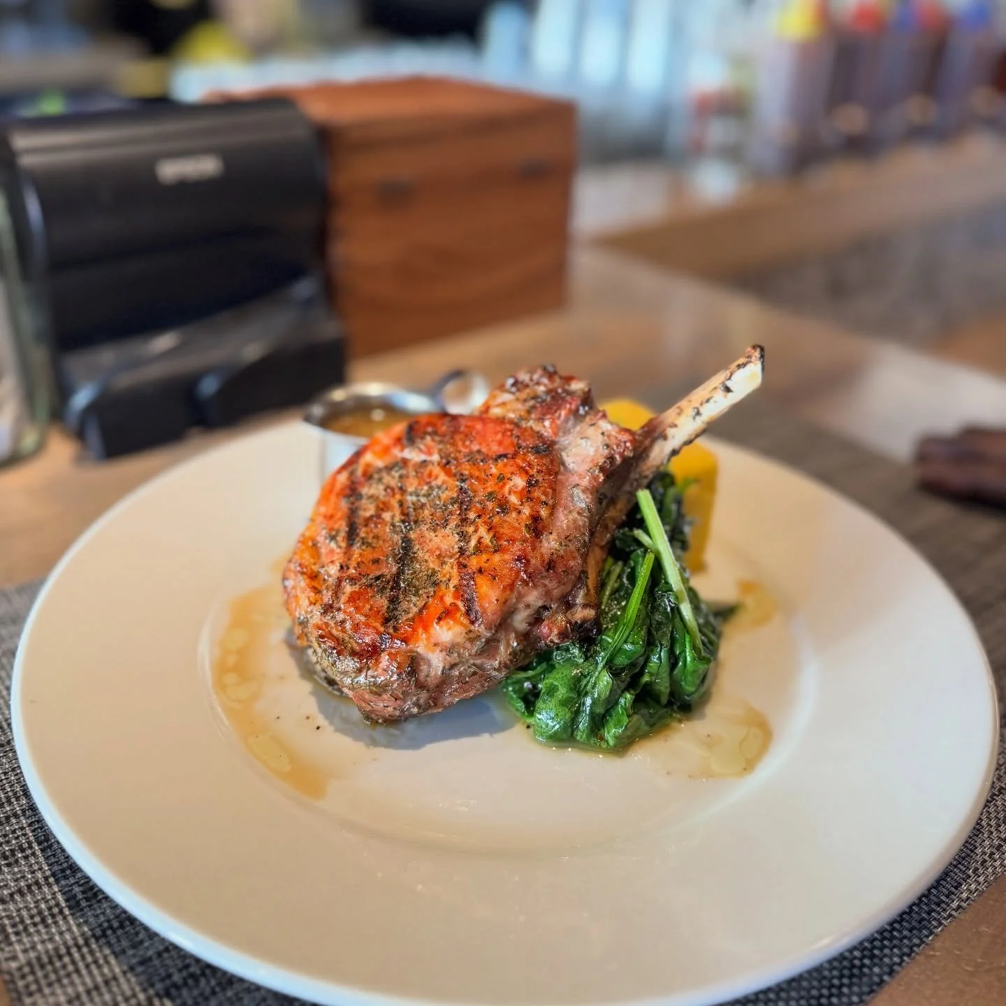 Thick. Juicy. Worth the wait. 😉

Our double-cut pork chop isn&rsquo;t here to rush&mdash;16oz of perfectly grilled goodness, polenta cake, spinach, and that whole grain mustard brandy sauce tying it all together.

Good things take time&hellip; and t