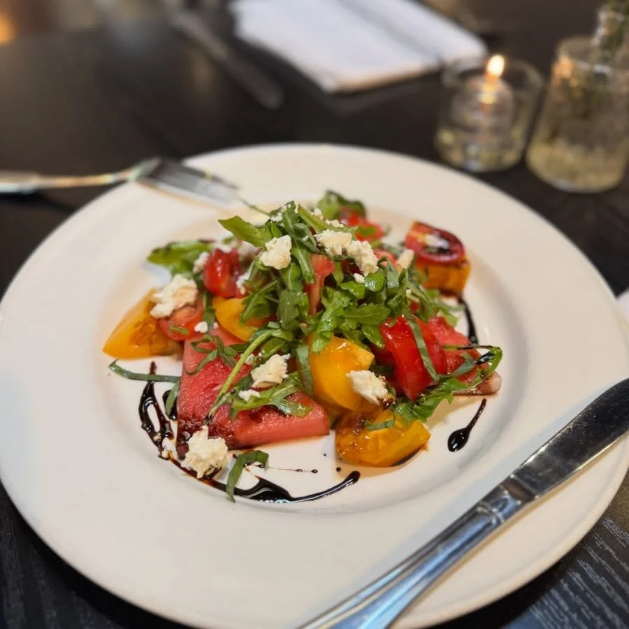 ✨ Meet your new summer obsession. ✨

A little sweet. A little salty. A little tangy. A whole lot of summer. ☀️🍉🍅

Our new Heirloom Tomato &amp; Watermelon Salad features heirloom tomatoes, watermelon, feta, arugula, fresh basil, and aged balsamic r