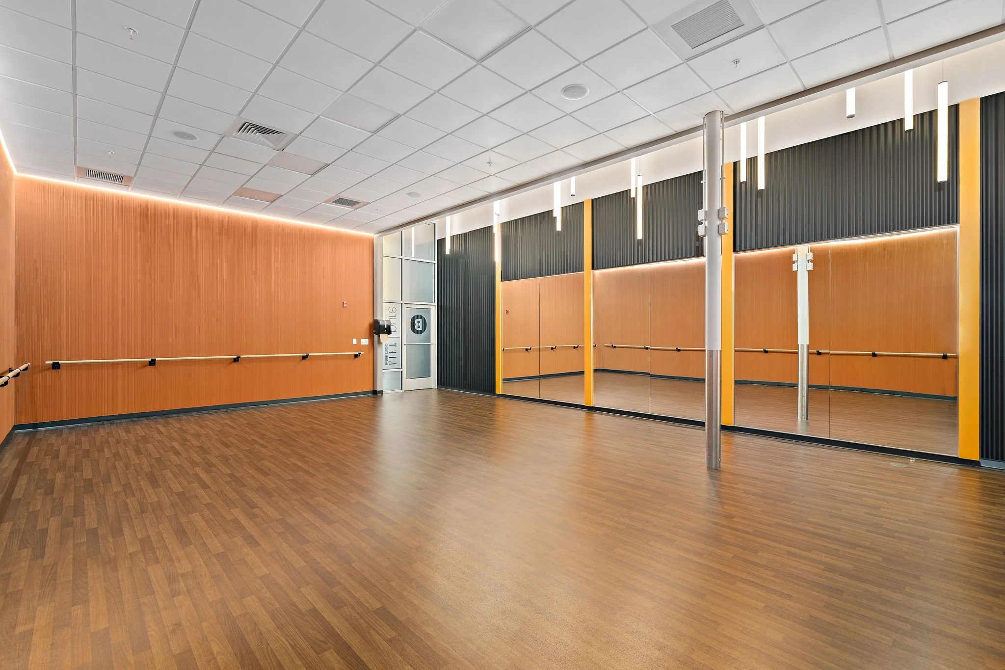 Hot yoga and barre studio at Best Fitness Woburn, MA designed by S3 Design. 