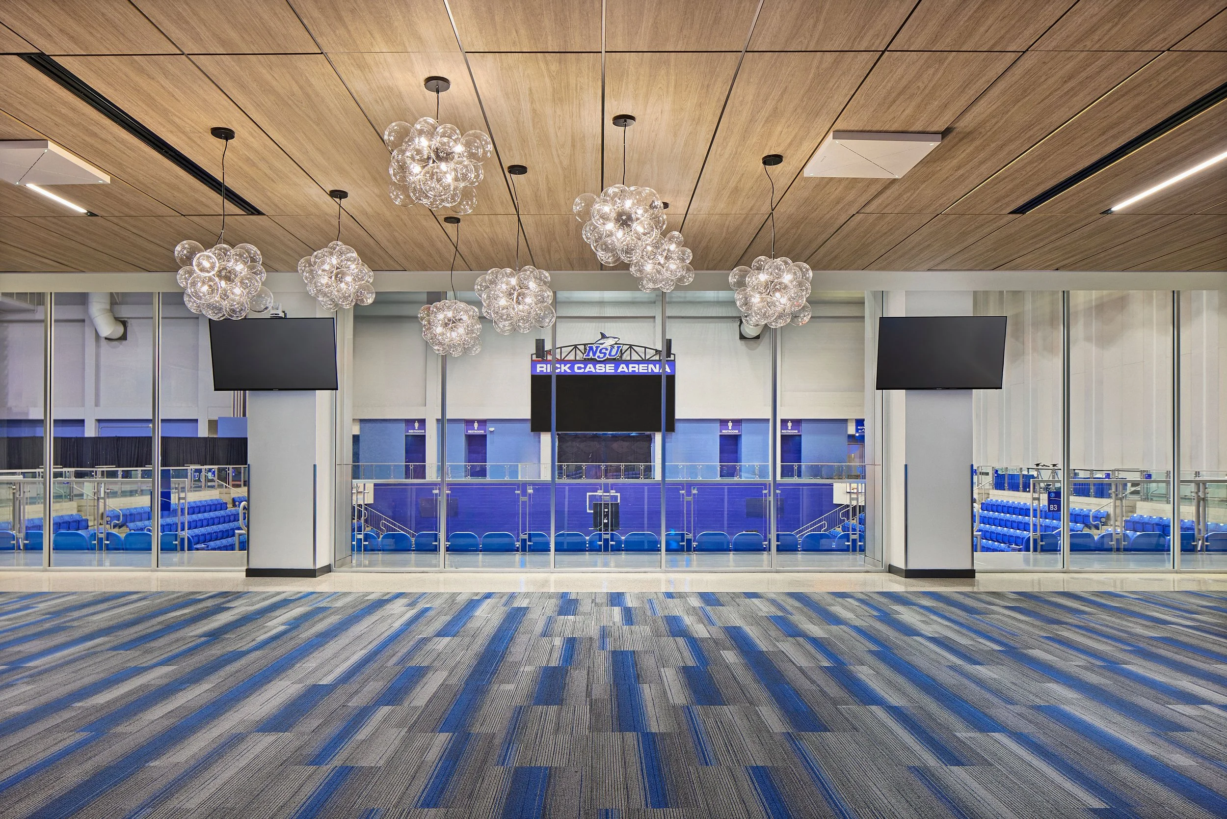 Athletic clubroom interior renovation at Rick Case Arena, Nova Southeastern University, showcasing S3 Design’s architecture and interior design for collegiate athletic facilities.