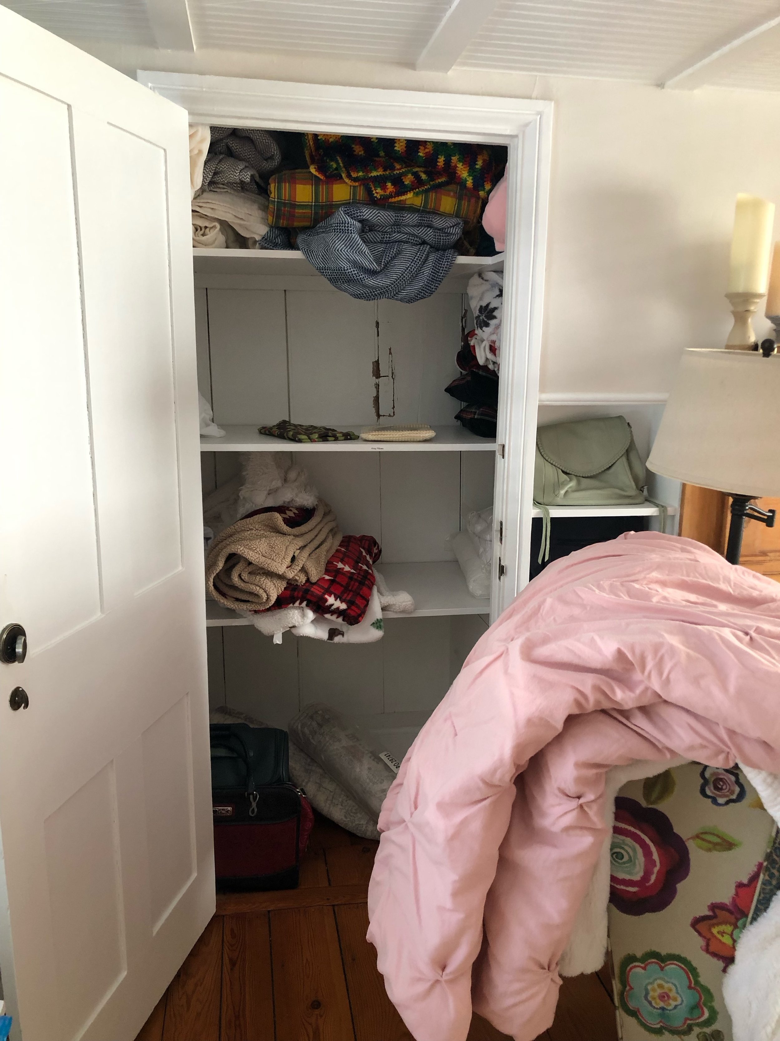 Overflow linen closet = Before