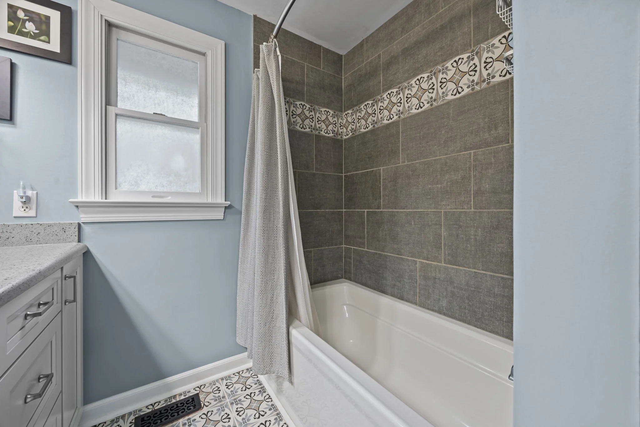 beautiful tile work and new bathtub