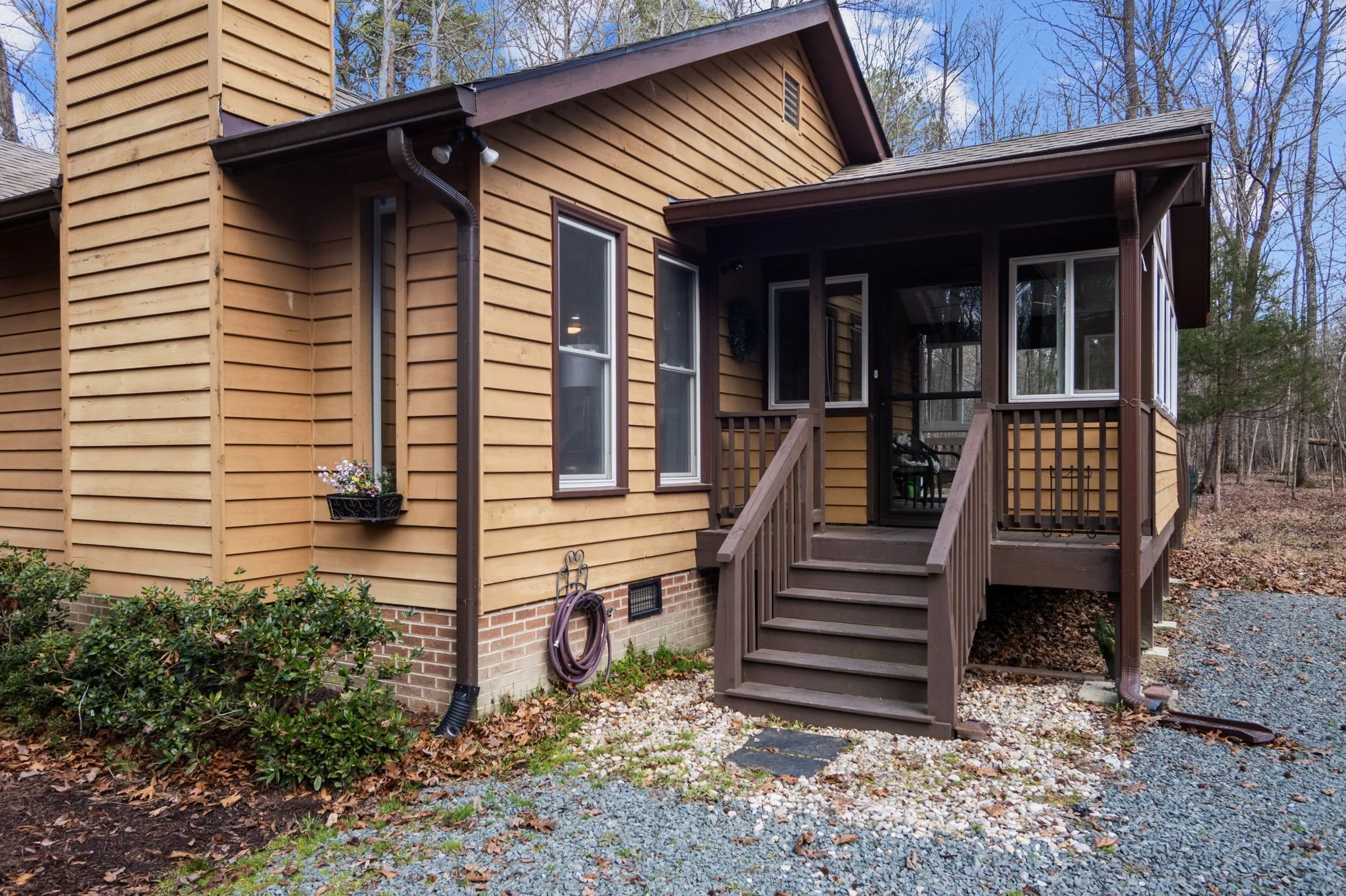 8814 Partridge Run Sun Porch Entry.jpg