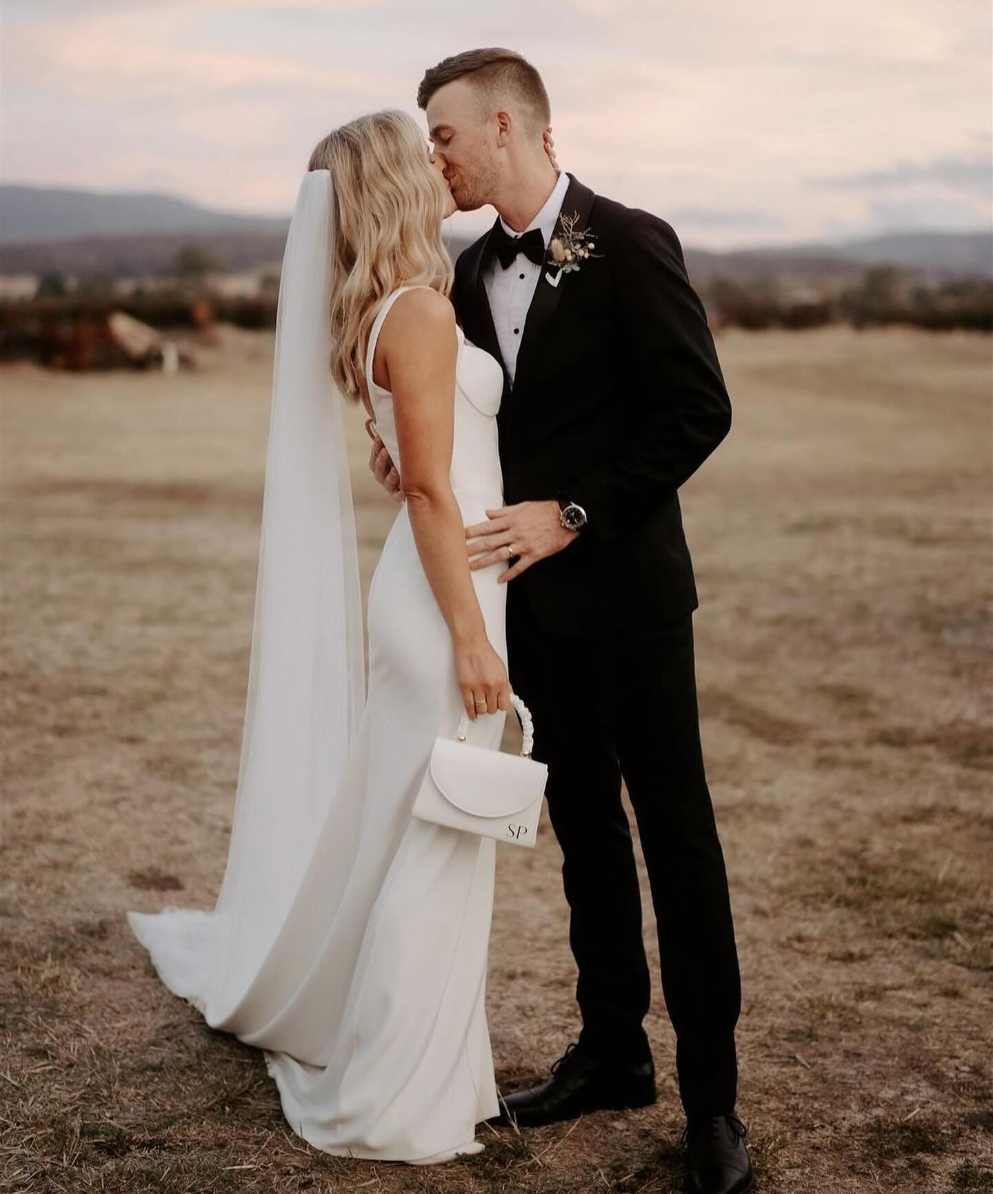 SPHERE BRIDE &mdash;&mdash; Sultry romance with @chosenbykyha Vincent gown for bride @staceyking_&rsquo;s Farm set wedding.

To try on and explore our full Chosen By Kyha collection in our Queensland gallery, book an appointment via the link in our b